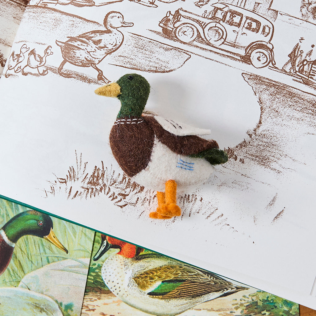 Mallard duck ornament crafted from natural wool, ideal for nature lovers, nursery shelves, or spring decorating.
