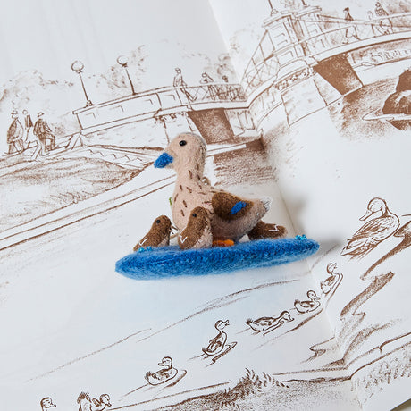 Charming duck ornament with pond scene, handcrafted from natural wool and stitched with love