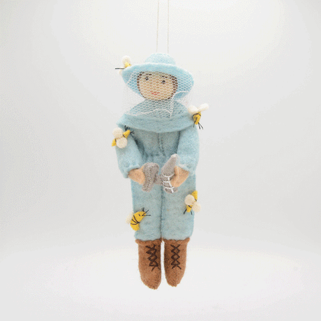Handmade blue beekeeper Christmas ornament supporting pollinator programs
