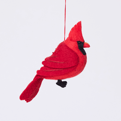 Handmade felt Cardinal ornament from Craftspring rotating to show front, side, and back views—featuring delicate beaded and embroidered details, ethically crafted by artisans using sustainable wool.