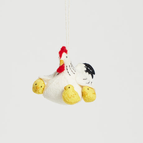 Charming felt hen with baby chicks ornament, lovingly crafted and ready to hang for seasonal celebrations.
