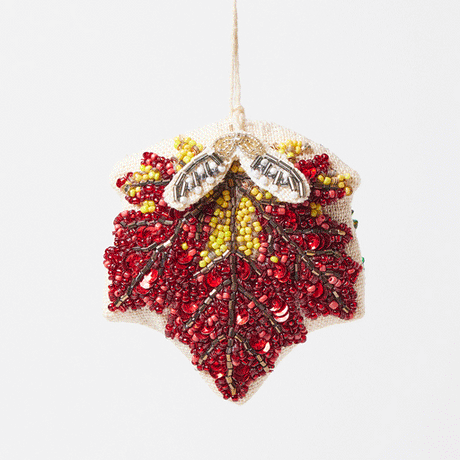 Autumn maple leaf ornament with detailed bead veins and dangling samaras, perfect for Thanksgiving or nature-inspired décor.