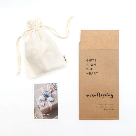 Beautifully packaged Craftspring ornament in a reusable gift pouch—sustainable, elegant, and ready for holiday giving