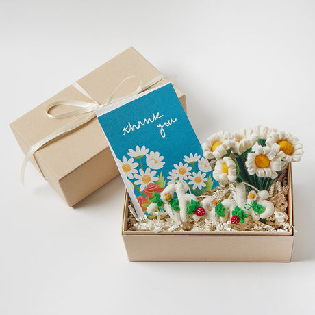 Thanks Gift Box Set featuring a felt strawberry ornament, white daisy flower bouquet in a glass vase, and a thank-you bouquet greeting card. Handmade from wool felt. Eco-friendly, fair trade, and ready to gift.