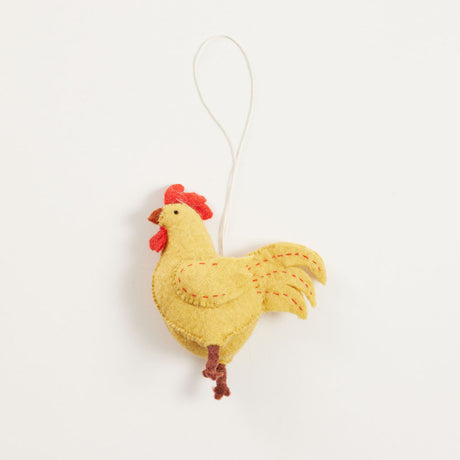 Farmhouse-style yellow rooster ornament, handmade using merino-blended wool, fair trade from Kyrgyzstan.