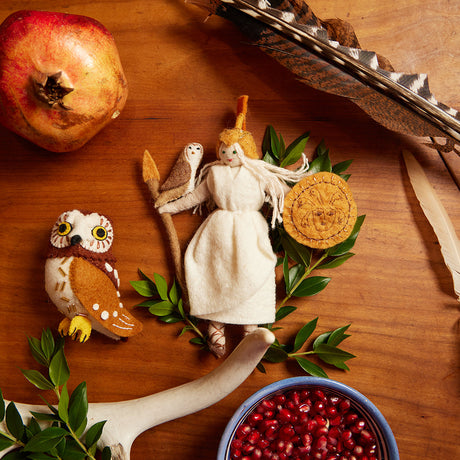 Handmade felt Christmas ornaments from Craftspring’s Ancient World & Zodiac Collection, featuring the goddess Athena and her wise owl—heirloom-quality holiday decor, ethically crafted by artisans in Kyrgyzstan and India using sustainable wool.