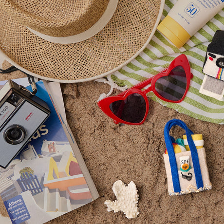 Charms to remember the fun and splash of summer holidays all year round, our vacation-inspired ornaments will liven up your winter celebrations