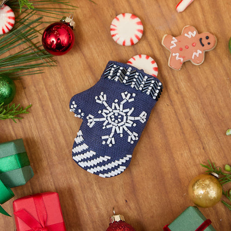 Mini Snowflake Mitten Ornament from Craftspring's Discontinued Collection, made of linen with beaded and embroidered details, displayed with mini presents and peppermint candies—heirloom-quality holiday decor, ethically crafted by artisans.