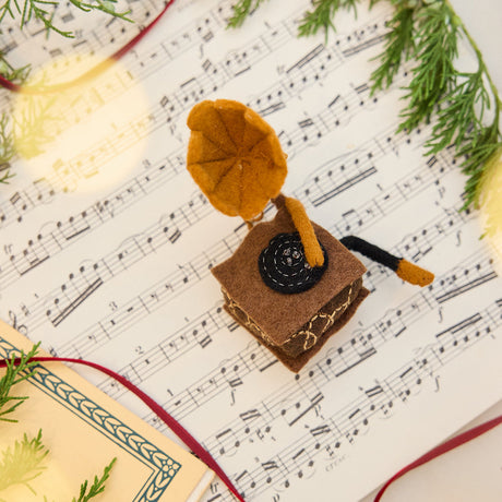 Handmade felt Phonograph Ornament from Craftspring's Analog Collection, vintage-style with beaded and embroidered details—heirloom-quality holiday decor, ethically crafted using sustainable wool.