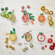 Shimmering hand-beaded apple ornament – a thoughtful gift for teachers, Rosh Hashanah, or fall celebrations.


