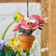 Fairly traded felt Garden Rose Pot ornament with lush wool flowers and buzzing bees, handcrafted for garden lovers and part of a whimsical seasonal décor set