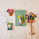 Felt garden-themed seed packet with jingling bells—perfect stocking stuffer or spring decor