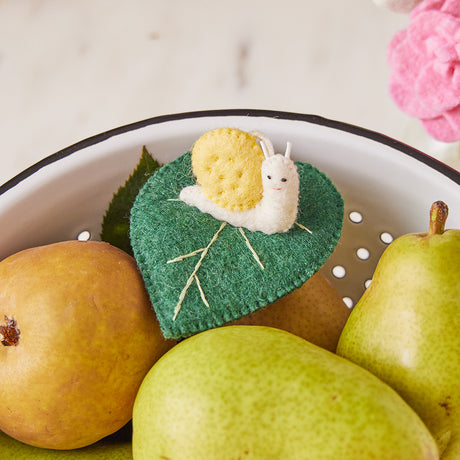 Handmade wool snail ornament – soft felt garden creature for seasonal tree or shelf