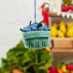 Felt blueberry pint ornament with hand-felted blue berries in a soft green wool basket. Handmade from natural wool felt using traditional needle-felting. Fair trade and ready to hang.