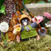 Wool felt mole ornament dressed in a yellow gardening hat and apron, holding a shovel in one paw and a flower-filled pot in the other—handcrafted and full of springtime charm