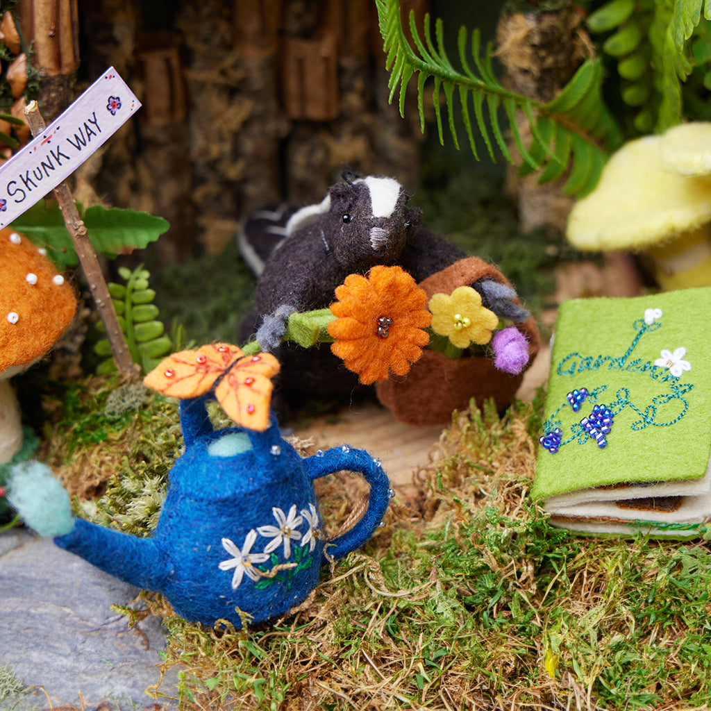 Skunk with Flowers Ornament