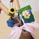Sunflower in blue felt flower pot – fair trade wool ornament perfect for gardeners, spring gifts, or sunny window displays.