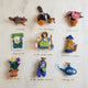 Handcrafted felt Gardening Collection ornaments – bees, herbs, vegetables, and garden critters made from sustainable wool.