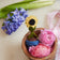 Hand-felted sunflower in blue wool pot – handcrafted ornament with beaded accents from the Gardening Collection.