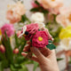 Hand-felted rose bouquet with beaded details and bee accent in recycled glass bud vase.