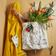 Oversized cotton canvas tote bag with black line illustrations of fruit and veggie ornaments – handmade in Brooklyn by Craftspring and Winter Water Factory.