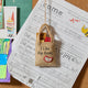Handmade felt ornament shaped like a tote bag filled with miniature felt books, including titles like Pride & Prejudice and War & Peace. Crafted from soft merino-blended wool, this quirky ornament is a playful nod to literary humor. Perfect for bookworms, teachers, librarians, and pun enthusiasts, it adds a clever touch to holiday trees, bookshelves, or classrooms. Ready to hang with a string attached.