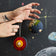 Hand-felted Planet Earth ornament set showing Earth’s surface and a cross-section of its inner layers. Educational, handmade wool ornaments for science lovers.

