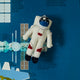 Felt astronaut ornament with helmet and stars, handmade and fair trade.

