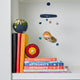 Felted wool solar system ornament with eight detailed planets and central sun, handcrafted for educational play, science gifts, or holiday décor.


