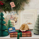 Handmade felt ornament of a wise lion wearing tiny felt glasses along with his public library reading card. Crafted from natural wool, this charming lion adds a storybook touch to holiday trees, reading nooks, or cozy corners. A delightful gift for readers, teachers, librarians, or anyone who loves books and imagination. Each ornament is unique, crafted with care using traditional felting techniques.