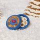 Bring back cherished holiday memories and taste the joy of the season with our felted Butter Cookies Tin Ornament, with beaded and embroidered details galore!