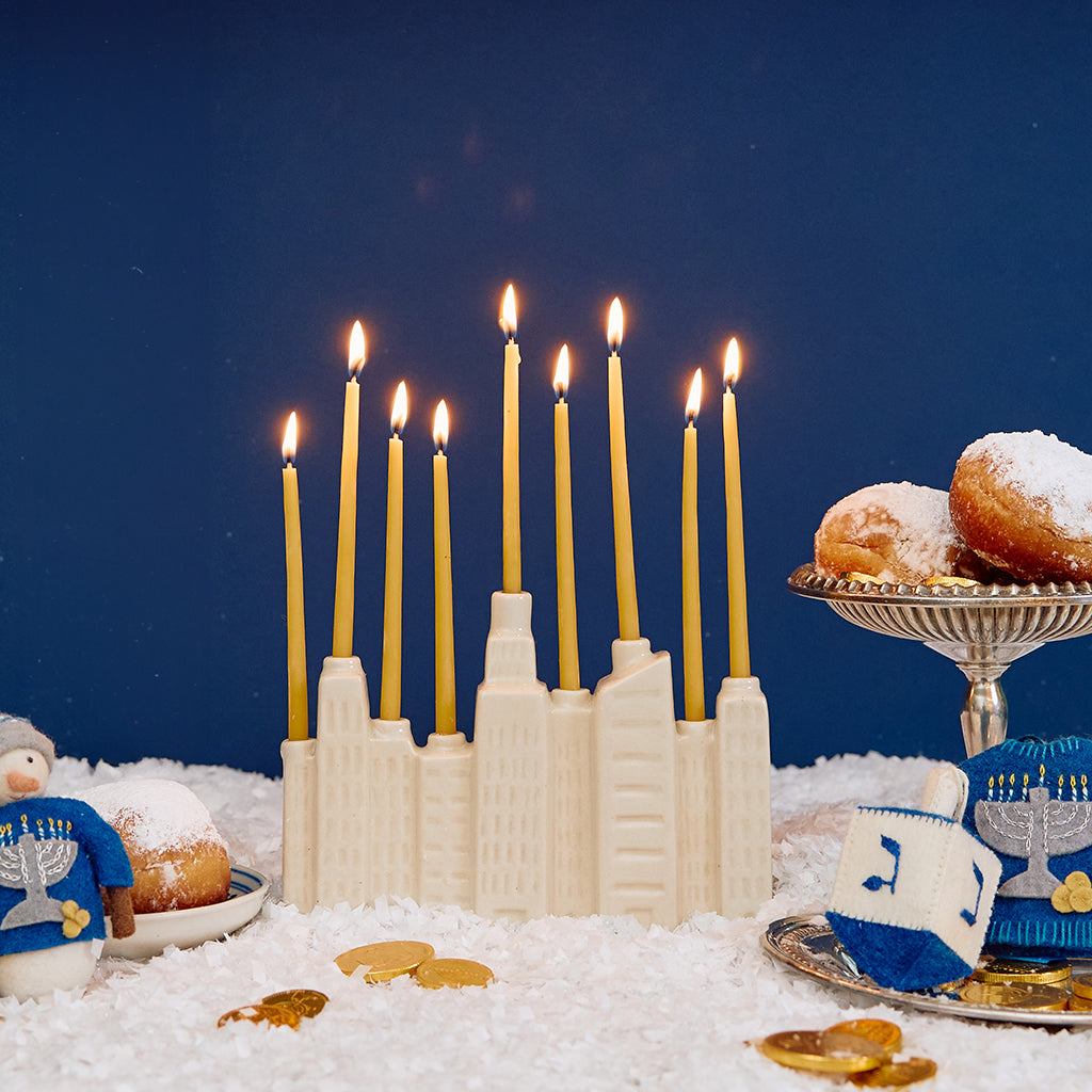 Handmade Cream NYC Skyline Ceramic Menorah & Candle Set – Craftspring Handmade Cream NYC Skyline Ceramic Menorah & Candle Set – Craftspring