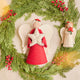 Angel with Poinsettia Bouquet