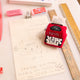 Felt red typewriter ornament with stitched keys, handmade and fair trade. Design process 