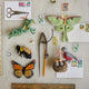 Felt wool Praying Mantis ornament with natural tones, bead accents, and delicate craftsmanship—an eco-conscious tribute to insect biodiversity