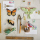 Eco-conscious Luna Moth ornament made from natural wool, symbolizing transformation and supporting youth environmental education through the Pollinator Collection