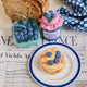 Felt pancake stack ornament topped with hand-felted blueberries and a yellow butter square.  Pictured with felt ornaments of a blueberry pint and jam.Handmade from natural wool felt using needle-felting. Fair trade and ready to hang.