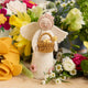 Handmade Spring Angel ornament holding baby chicks – a symbol of renewal and hope for Easter or springtime décor.