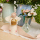 Recycled glass bud vase paired with handmade felt wildflower stems