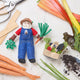 In the Garden Santa ornament with farm-to-table charm and festive felt details