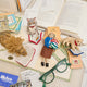 Felt librarian figure ornament, lovingly handmade for bookworms, writers, and those who find joy in every chapter.