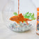 Handmade felt Goldfish ornament from Craftspring, featuring intricate beaded and embroidered shimmering details—displayed in a fish bowl, perfect for aquarium lovers and pet-themed holiday gifting, ethically crafted by artisans using sustainable wool.