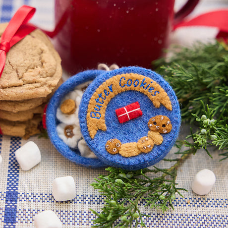 Bring back cherished holiday memories and taste the joy of the season with this blue Butter Cookies Tin Ornament