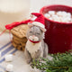 Handmade felt Santa Cat ornament from Craftspring, featuring a gray cat wearing a red Santa hat—displayed with a mug of hot cocoa and cookies, perfect for festive cat lovers and cozy holiday gifting, ethically crafted by artisans using sustainable wool.