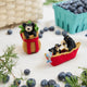 Craftspring’s handmade felt Adirondack Basket with Black Bear Cub and Bears in a Canoe ornaments — a playful black bear cub peeking from a cozy brown basket and a mama bear paddling a canoe with a cub climbing over the side, displayed together for a whimsical holiday scene, perfect for Christmas decorating or gifting, ethically crafted by artisans using sustainable wool.