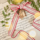 Festive Metal Bell with Embroidered Ribbon