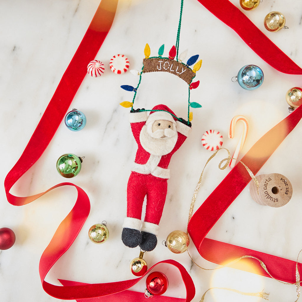 Jolly Swinging Santa Ornament