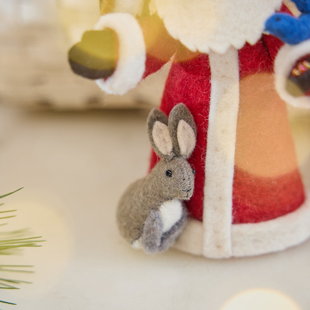 Craftspring’s handmade felt Santa with Woodland Animals ornament — close-up detail of the bunny next to Santa, highlighting the intricate felt and beaded details, perfect for Christmas decorating or gifting, ethically crafted by artisans using sustainable wool.