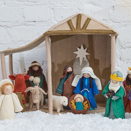 Handmade felt Nativity Barn from Craftspring, designed to beautifully display the Holy Night Nativity Scene — sturdy felt construction with intricate details, ethically crafted by artisans using sustainable wool.