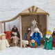Handmade felt Nativity Barn from Craftspring, designed to beautifully display the Holy Night Nativity Scene — sturdy felt construction with intricate details, ethically crafted by artisans using sustainable wool.